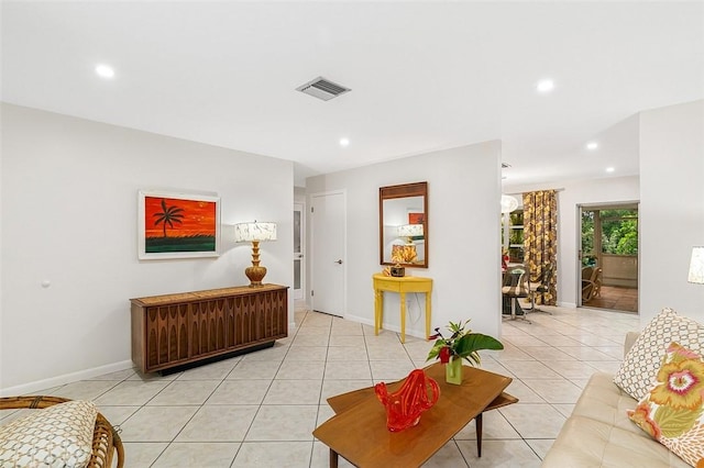 850 Gilbert St, Sebastian, FL 32958 - living room featuring light tile patterned flooring, recessed lighting, and baseboards