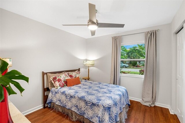 850 Gilbert St, Sebastian, FL 32958 - bedroom with wood finished floors, baseboards, and ceiling fan