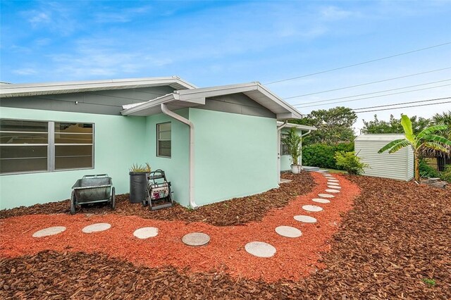 850 Gilbert St, Sebastian, FL 32958 - view of side of property featuring stucco siding