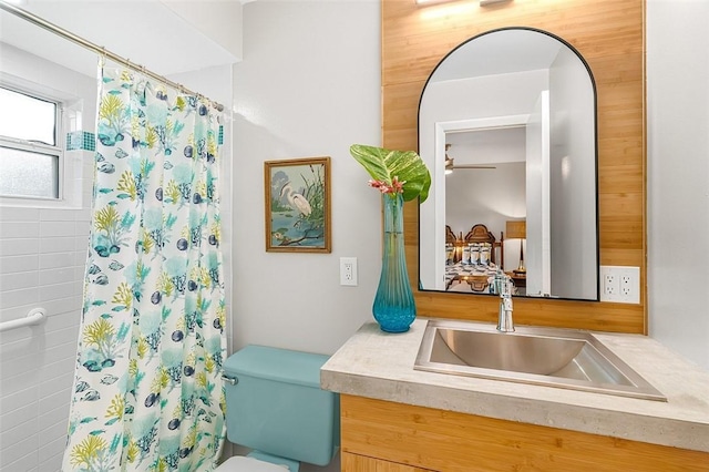 850 Gilbert St, Sebastian, FL 32958 - bathroom featuring vanity, curtained shower, and toilet