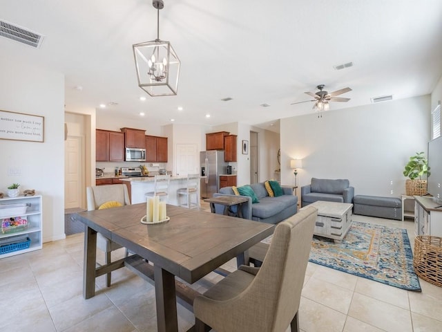 dining area featuring light tile patterned floors, visible vents, and recessed lighting