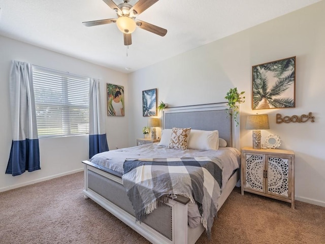 carpeted bedroom featuring baseboards and ceiling fan