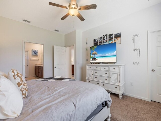 bedroom featuring ceiling fan, light colored carpet, visible vents, and baseboards