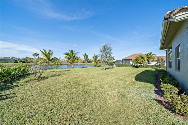 view of yard with a water view