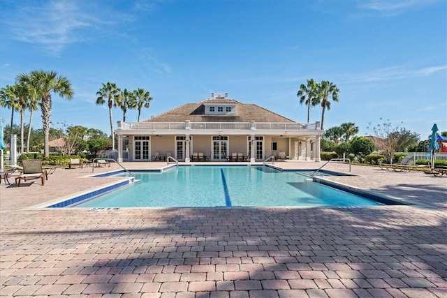 view of swimming pool featuring a patio area