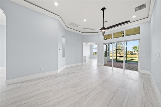 unfurnished room featuring ornamental molding and ceiling fan