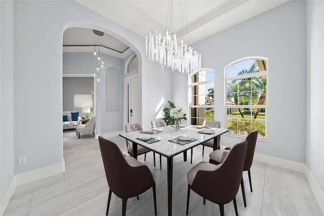 dining space featuring a chandelier