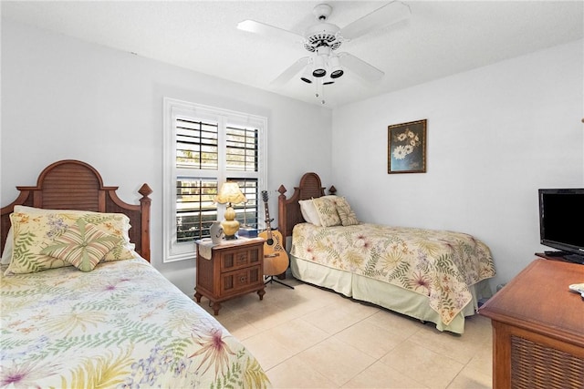 bedroom with light tile patterned floors and ceiling fan