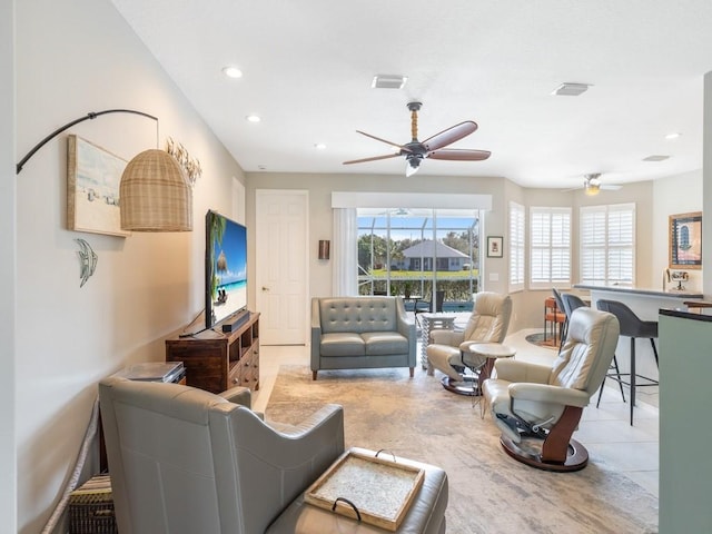 living room featuring ceiling fan