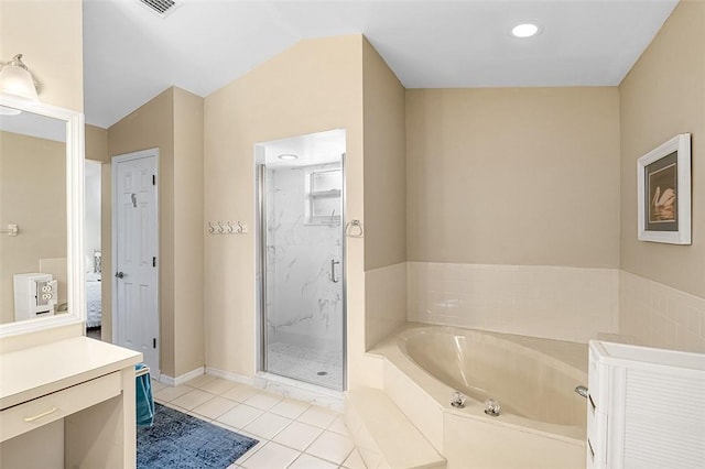 full bath with a marble finish shower, vaulted ceiling, vanity, tile patterned flooring, and a bath