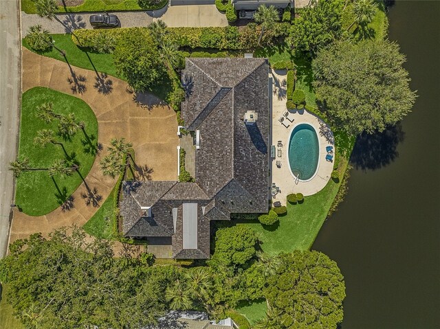 birds eye view of property featuring a water view