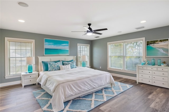 5440 95th St, Sebastian, FL 32958 - bedroom with wood finished floors, a ceiling fan, and recessed lighting
