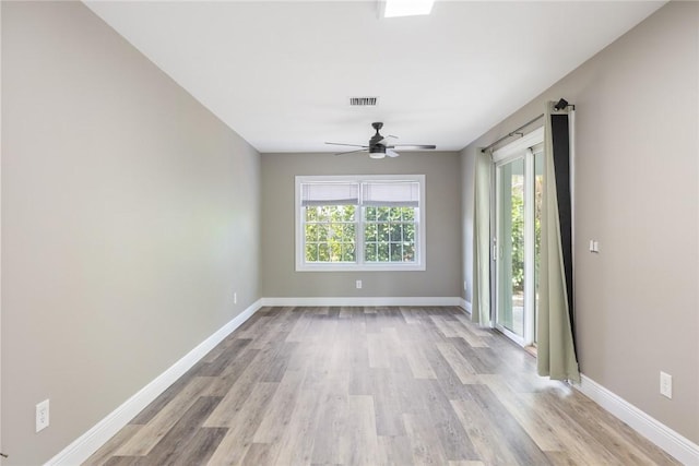 5440 95th St, Sebastian, FL 32958 - spare room with ceiling fan and light wood finished floors