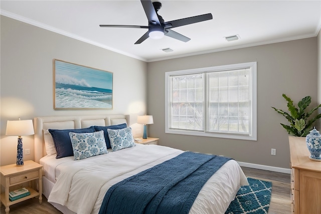 5440 95th St, Sebastian, FL 32958 - bedroom featuring wood finished floors, crown molding, and ceiling fan