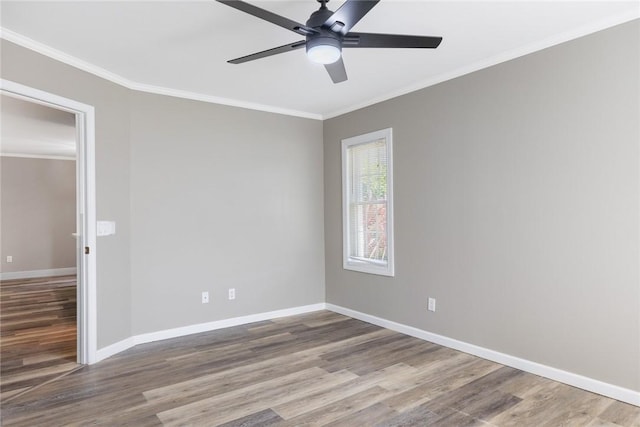 5440 95th St, Sebastian, FL 32958 - empty room with wood finished floors, crown molding, and a ceiling fan