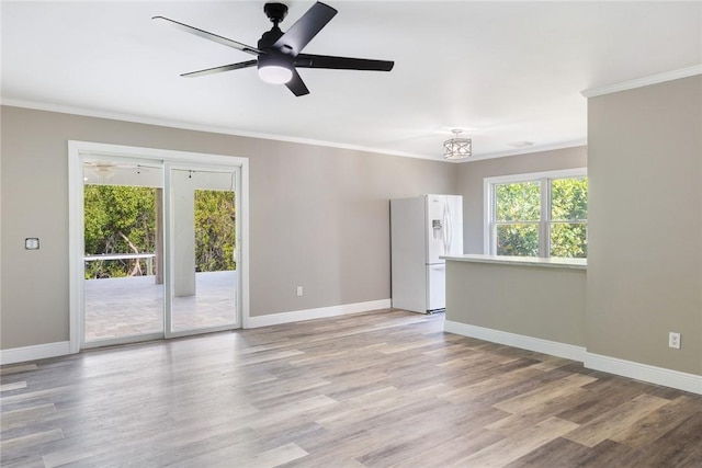 5440 95th St, Sebastian, FL 32958 - unfurnished room featuring ornamental molding, light wood-style flooring, and ceiling fan