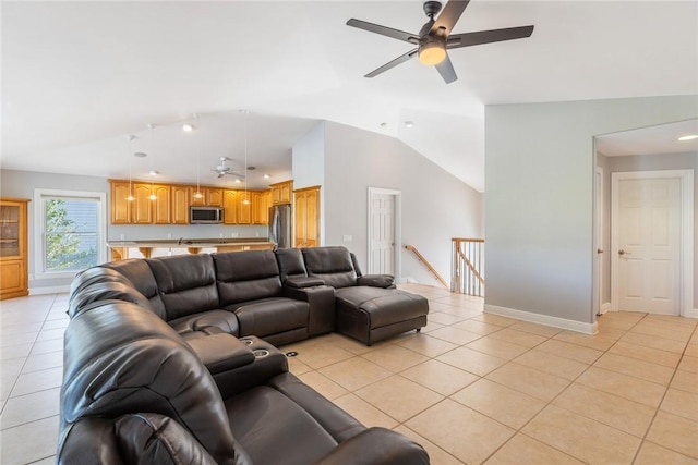 5440 95th St, Sebastian, FL 32958 - living room featuring light tile patterned floors, ceiling fan, lofted ceiling, and recessed lighting