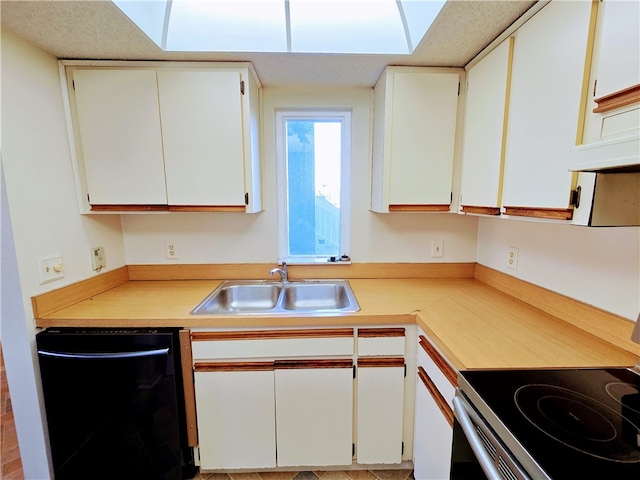 kitchen with dishwasher, white cabinetry, sink, and electric range