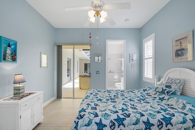 bedroom featuring a closet, connected bathroom, ceiling fan, and light tile patterned floors