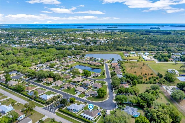 drone / aerial view featuring a water view