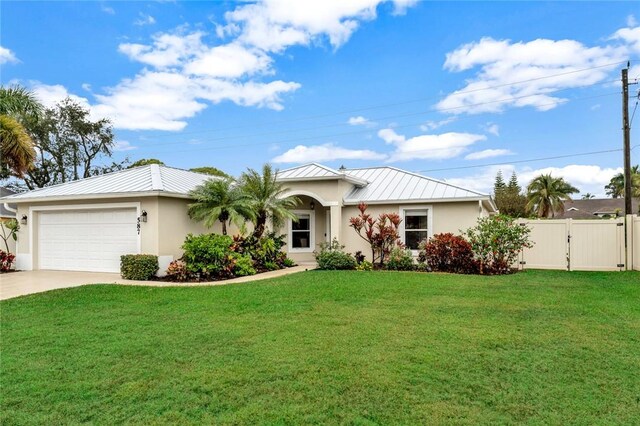 single story home with a front lawn and a garage