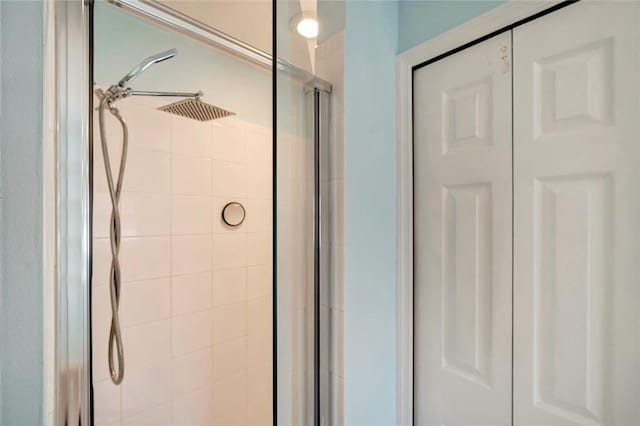 bathroom featuring an enclosed shower