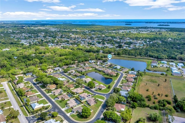 drone / aerial view featuring a water view