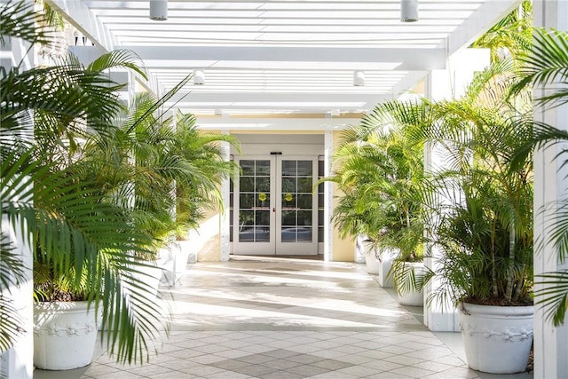 entrance to property featuring french doors