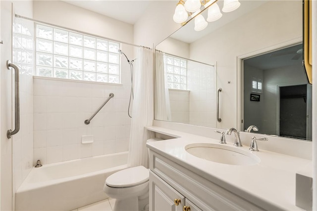 full bathroom with vanity, toilet, and shower / bath combo with shower curtain