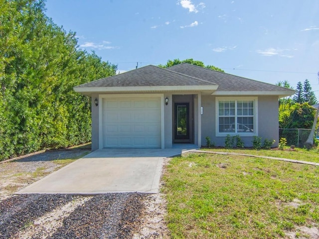 ranch-style home featuring stucco siding, a front lawn, driveway, fence, and roof with shingles