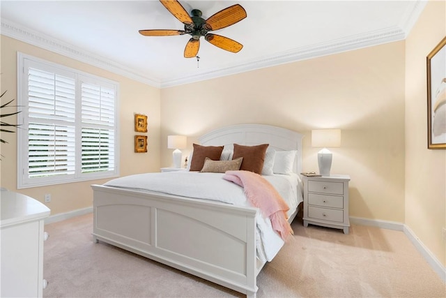 bedroom with crown molding, light colored carpet, and ceiling fan