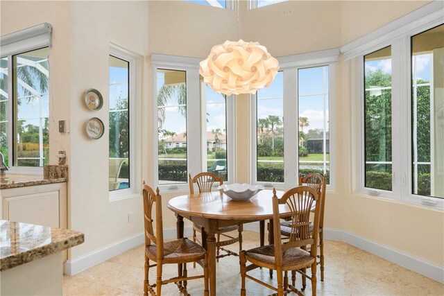 sunroom featuring a wealth of natural light