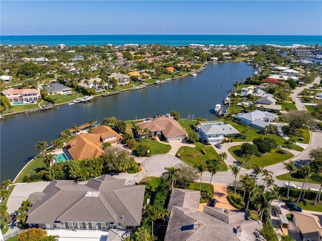 drone / aerial view with a water view