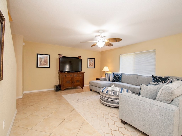 living room with light tile patterned floors and ceiling fan