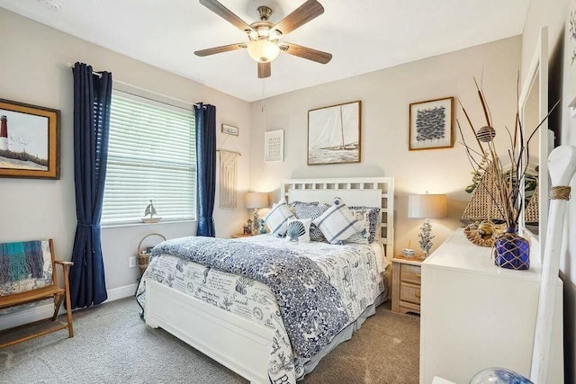 bedroom featuring carpet floors, baseboards, and a ceiling fan