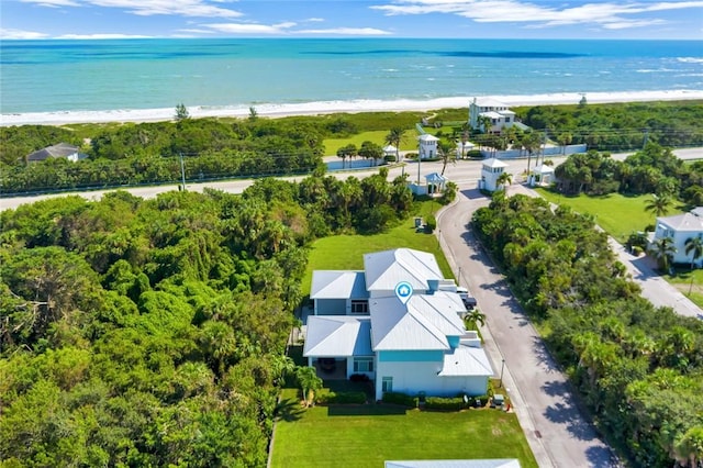 aerial view with a beach view and a water view