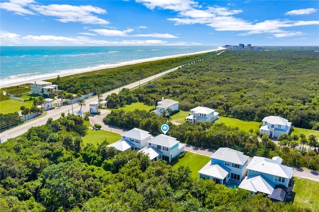 bird's eye view with a water view and a view of the beach