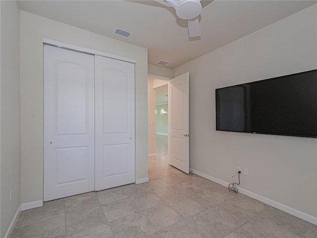 5190 Unity Sq, Vero Beach, FL 32967 - unfurnished bedroom with a closet and a ceiling fan