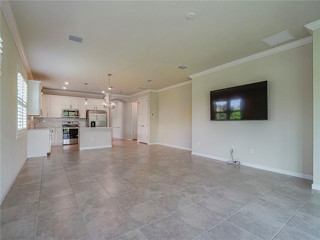5190 Unity Sq, Vero Beach, FL 32967 - unfurnished living room with ornamental molding, recessed lighting, a chandelier, and light tile patterned floors