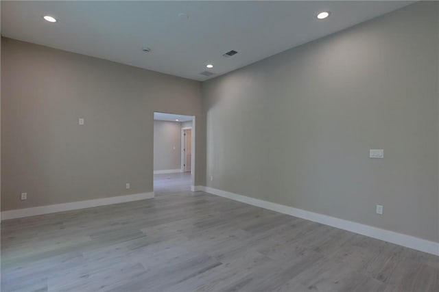 7985 99th Ave, Vero Beach, FL 32967 - empty room with recessed lighting and light wood-type flooring
