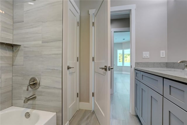 7985 99th Ave, Vero Beach, FL 32967 - full bathroom with vanity and washtub / shower combination