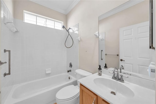 full bath with vanity, crown molding, toilet, and washtub / shower combination