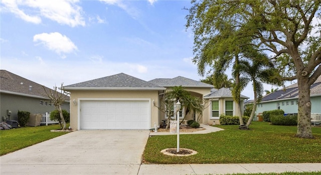 single story home featuring a garage, driveway, a front lawn, and stucco siding