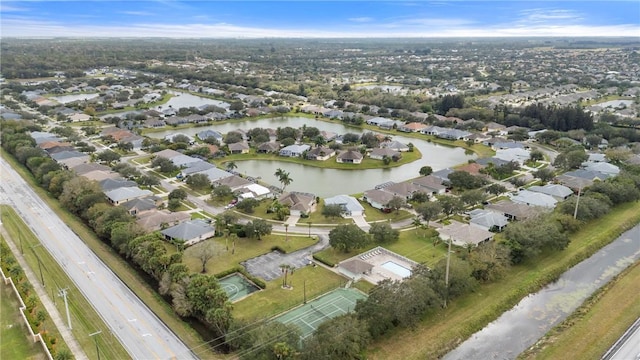 aerial view with a residential view and a water view