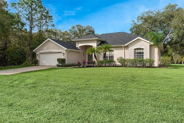 single story home featuring a front yard and a garage