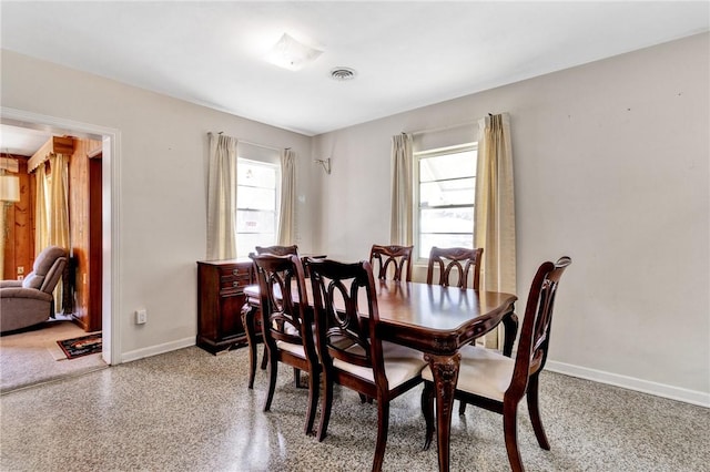 dining room with a healthy amount of sunlight