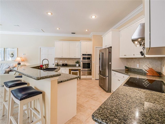 kitchen with a center island with sink, exhaust hood, white cabinets, and appliances with stainless steel finishes