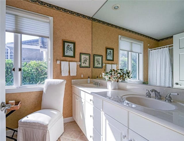 bathroom featuring vanity, a shower with curtain, and tile patterned floors