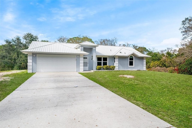 single story home featuring a garage and a front yard