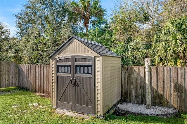 view of outdoor structure with a yard